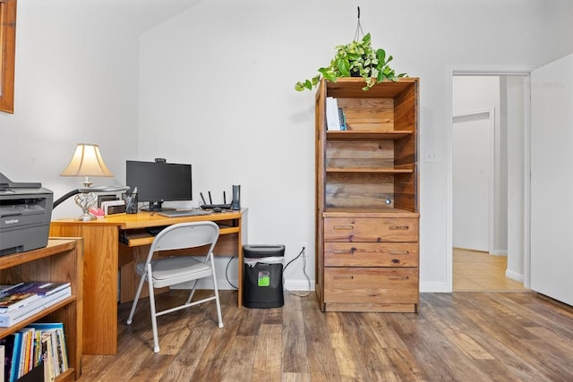 200 Callahan Ln, Leander, TX 78641 - home office featuring baseboards and wood finished floors