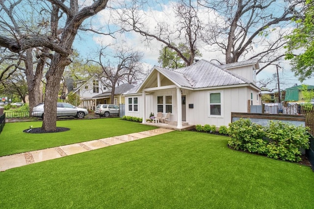 1802 Eva St, Austin, TX 78704 - bungalow-style house featuring board and batten siding and metal roof