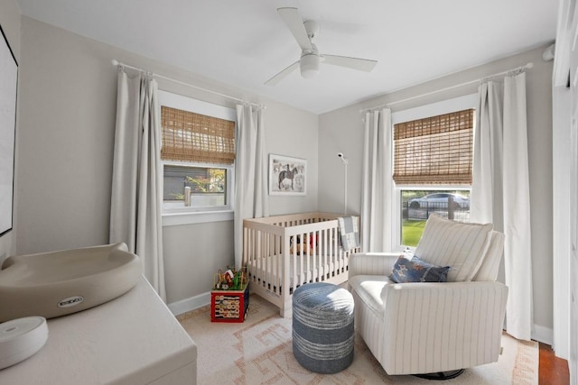 1802 Eva St, Austin, TX 78704 - bedroom featuring multiple windows, a ceiling fan, and baseboards