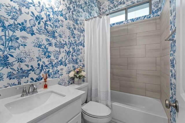 236 Diamondback Dr, Georgetown, TX 78628 - bathroom with wallpapered walls, toilet, shower / tub combo, and vanity