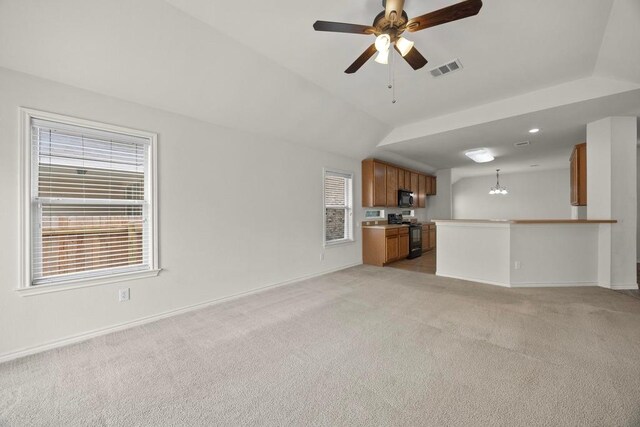 2832 Mission Tejas Dr, Pflugerville, TX 78660 - unfurnished living room featuring light carpet, plenty of natural light, ceiling fan, and a chandelier