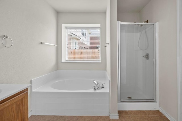 2832 Mission Tejas Dr, Pflugerville, TX 78660 - bathroom with a stall shower, a garden tub, and vanity