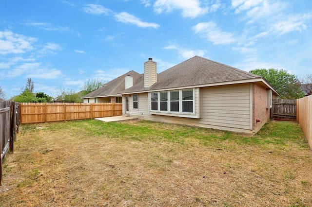 2832 Mission Tejas Dr, Pflugerville, TX 78660 - back of house featuring a patio area, a chimney, and brick siding