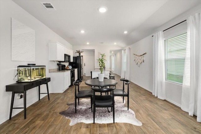 249 Calgary Ln, San Marcos, TX 78666 - dining space with wood finished floors and recessed lighting