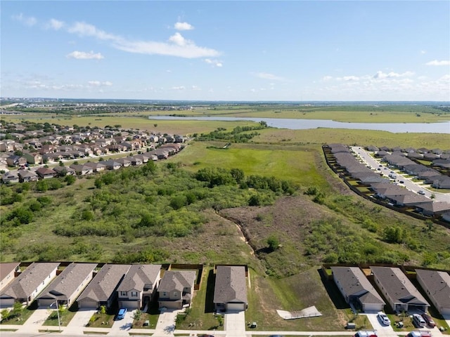249 Calgary Ln, San Marcos, TX 78666 - aerial view of property and surrounding area featuring a large body of water and nearby suburban area