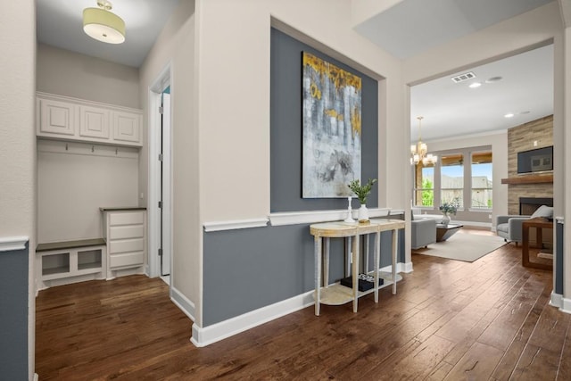 6009 Empresa Dr, Austin, TX 78738 - hall with dark wood-style flooring, baseboards, a chandelier, and recessed lighting