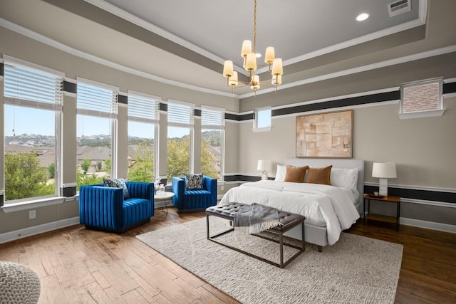 6009 Empresa Dr, Austin, TX 78738 - bedroom with a chandelier, hardwood / wood-style floors, baseboards, and crown molding