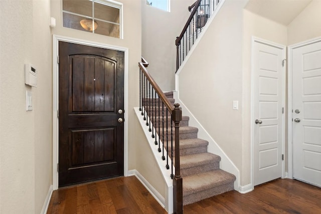 7709 Menchaca Rd Unit 35, Austin, TX 78745 - entryway with dark wood finished floors and stairs