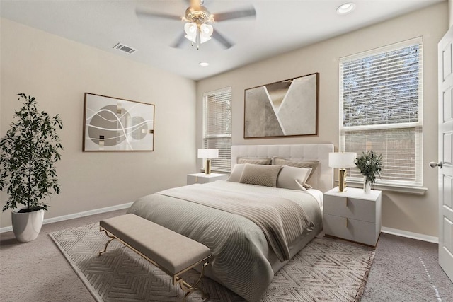 7709 Menchaca Rd Unit 35, Austin, TX 78745 - carpeted bedroom with a ceiling fan and recessed lighting