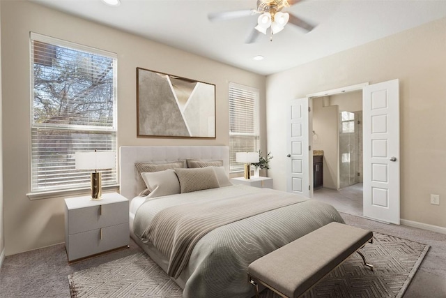 7709 Menchaca Rd Unit 35, Austin, TX 78745 - bedroom with light carpet, ensuite bath, a ceiling fan, and recessed lighting