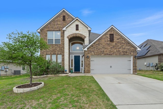 1806 Ashburn Dr, Temple, TX 76502 - traditional-style house with brick siding, concrete driveway, a front yard, and a garage