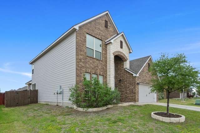 1806 Ashburn Dr, Temple, TX 76502 - traditional home with brick siding, concrete driveway, and a garage