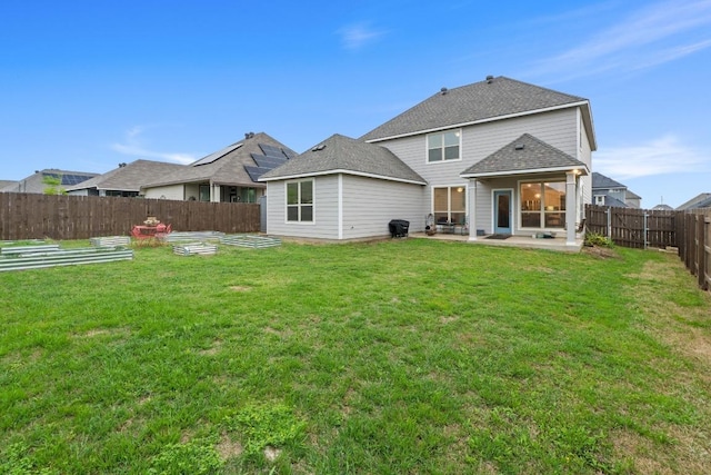 1806 Ashburn Dr, Temple, TX 76502 - rear view of property featuring a patio, a garden, and a fenced backyard