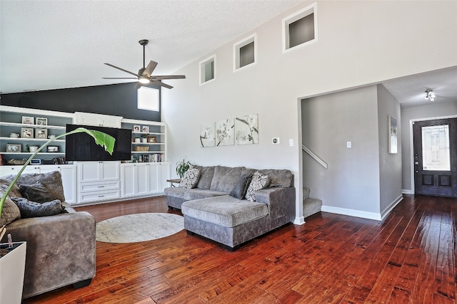 11501 Oak Knoll Dr, Austin, TX 78759 - living room featuring high vaulted ceiling, ceiling fan, hardwood / wood-style floors, stairs, and a textured ceiling