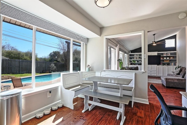 11501 Oak Knoll Dr, Austin, TX 78759 - dining area with lofted ceiling, a ceiling fan, and wood finished floors