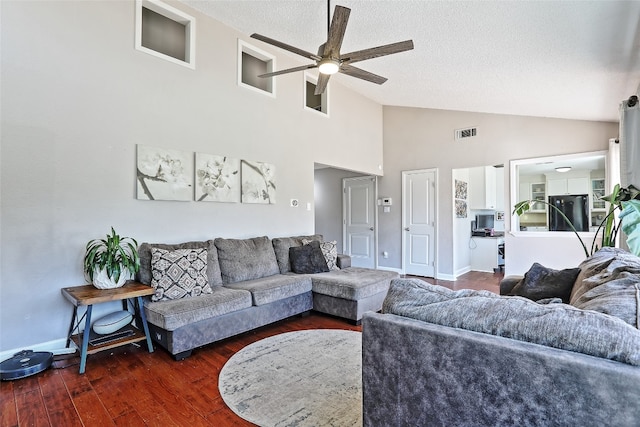 11501 Oak Knoll Dr, Austin, TX 78759 - living room with a ceiling fan, a textured ceiling, high vaulted ceiling, and wood finished floors
