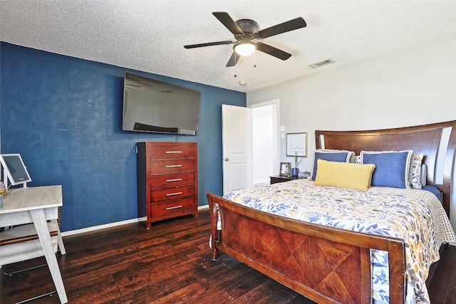 11501 Oak Knoll Dr, Austin, TX 78759 - bedroom with hardwood / wood-style flooring, a textured ceiling, and ceiling fan
