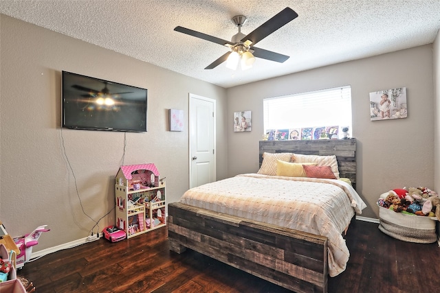 11501 Oak Knoll Dr, Austin, TX 78759 - bedroom featuring wood finished floors, a textured ceiling, and ceiling fan
