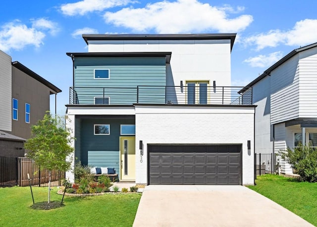 6020 Sendero Hills Pkwy, Austin, TX 78724 - modern home featuring a balcony, an attached garage, and driveway