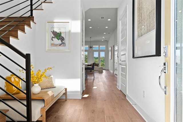 6020 Sendero Hills Pkwy, Austin, TX 78724 - foyer with recessed lighting, stairway, and hardwood / wood-style floors