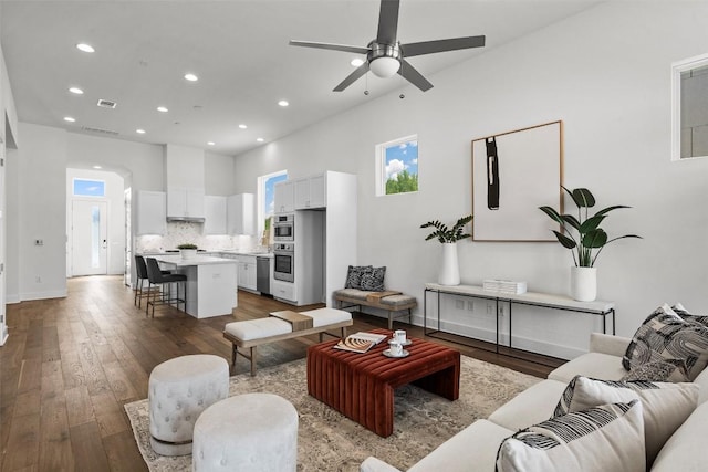 6020 Sendero Hills Pkwy, Austin, TX 78724 - living room with recessed lighting, hardwood / wood-style floors, ceiling fan, and a high ceiling