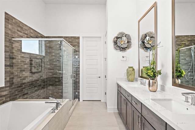 6020 Sendero Hills Pkwy, Austin, TX 78724 - full bath featuring double vanity, a stall shower, a bath, and tile patterned floors