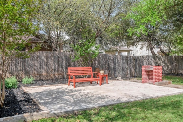 view of patio featuring a fenced backyard