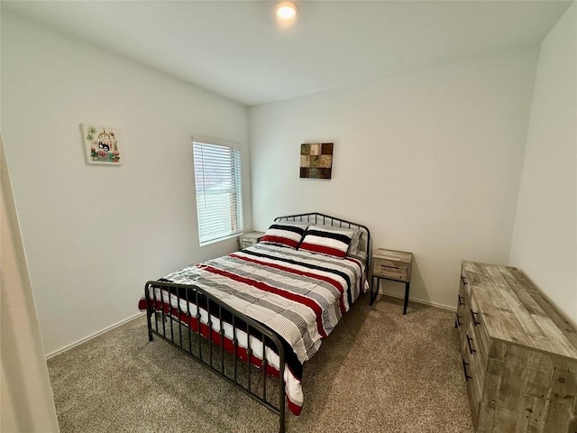 234 George Neggan Ln, Bastrop, TX 78602 - carpeted bedroom with baseboards