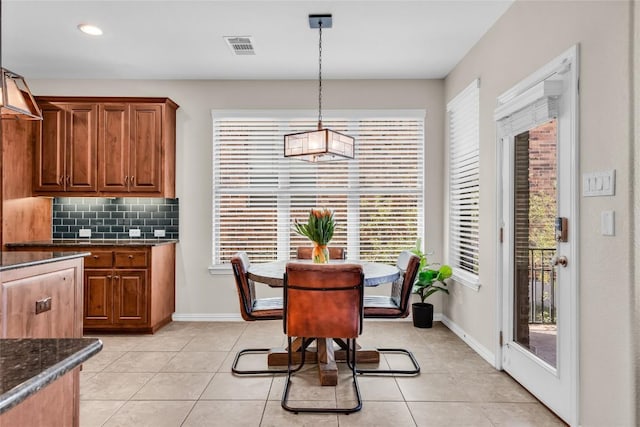 3925 Good Night Trl, Leander, TX 78641 - dining space featuring light tile patterned flooring and recessed lighting