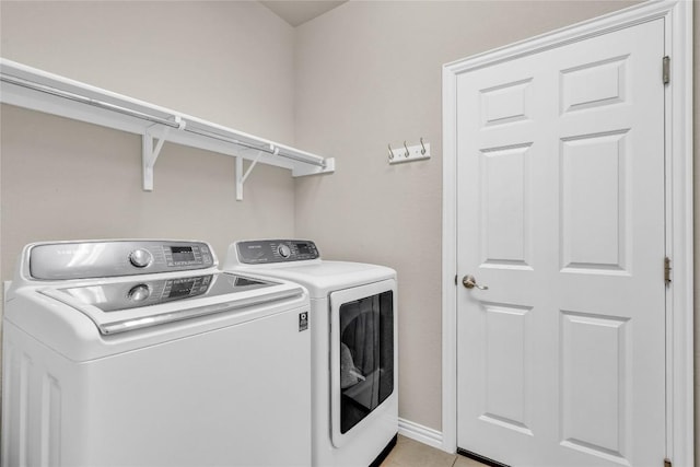 3925 Good Night Trl, Leander, TX 78641 - washroom with washing machine and clothes dryer and baseboards