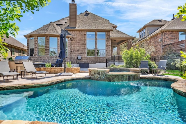3925 Good Night Trl, Leander, TX 78641 - view of swimming pool featuring a patio area and a pool with connected hot tub