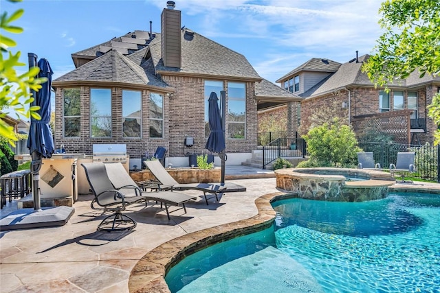 3925 Good Night Trl, Leander, TX 78641 - view of swimming pool featuring a patio, a pool with connected hot tub, and area for grilling