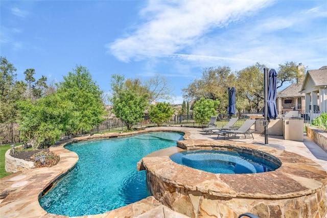 3925 Good Night Trl, Leander, TX 78641 - view of swimming pool featuring a fenced backyard, a patio area, and a pool with connected hot tub