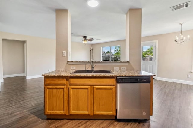804 Lavaca Loop, Elgin, TX 78621 - kitchen with stainless steel dishwasher, wood finished floors, and ceiling fan