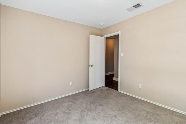 804 Lavaca Loop, Elgin, TX 78621 - empty room with carpet and a smoke detector