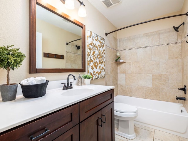 8004 Osborne Dr, Austin, TX 78729 - bathroom with vanity, toilet, washtub / shower combination, and tile patterned floors