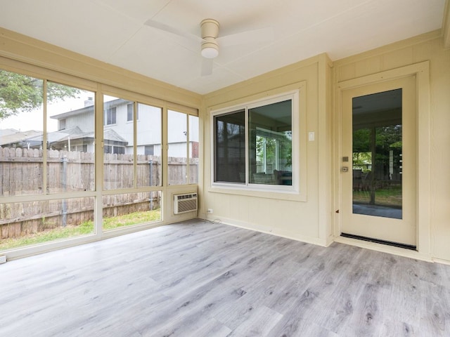 8004 Osborne Dr, Austin, TX 78729 - unfurnished sunroom featuring a wall unit AC