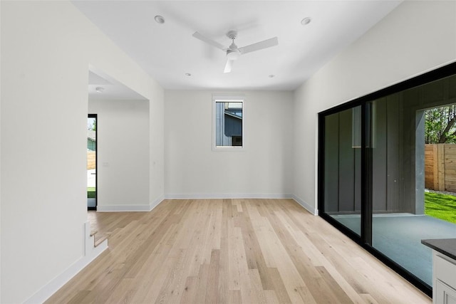 3306 Larry Ln Unit B, Austin, TX 78722 - empty room featuring light wood-style flooring and ceiling fan