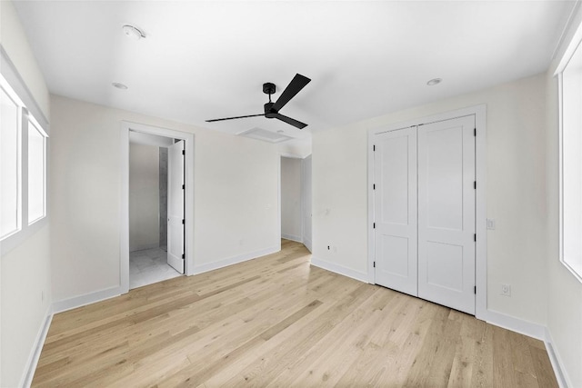 3306 Larry Ln Unit B, Austin, TX 78722 - unfurnished bedroom with light wood finished floors, a closet, connected bathroom, and a ceiling fan