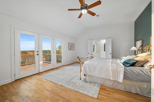 5204 Eagle Trace Trl, Austin, TX 78730 - bedroom featuring access to exterior, french doors, vaulted ceiling, ornamental molding, and wood finished floors