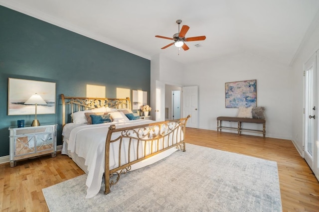 5204 Eagle Trace Trl, Austin, TX 78730 - bedroom featuring wood finished floors, lofted ceiling, and a ceiling fan