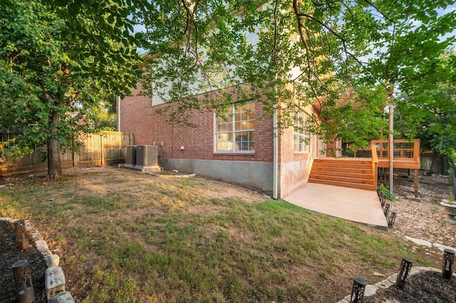 5204 Eagle Trace Trl, Austin, TX 78730 - view of yard featuring a patio, a deck, and central AC
