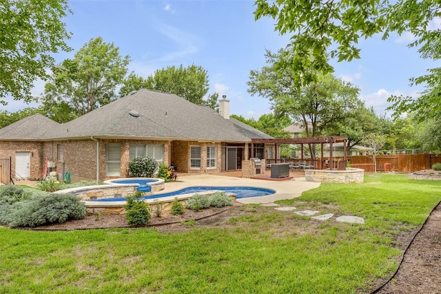 3028 Indigo Trl, Round Rock, TX 78665 - back of property with a chimney, brick siding, a patio, and a pool with connected hot tub