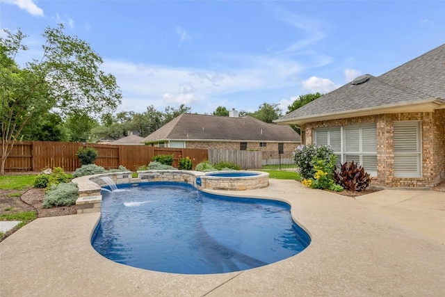 3028 Indigo Trl, Round Rock, TX 78665 - view of swimming pool featuring a fenced backyard, a patio, and a pool with connected hot tub