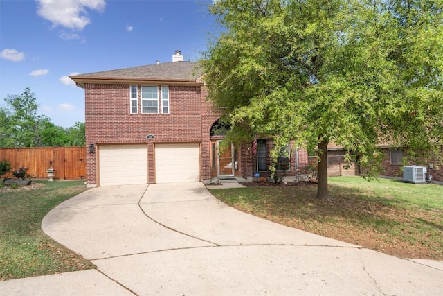 402 Sophie Ct, Pflugerville, TX 78660 - view of front of home with brick siding, driveway, an attached garage, central AC, and a chimney
