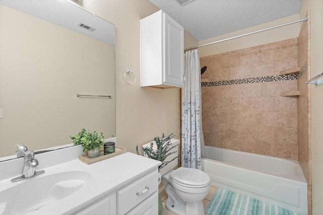bathroom featuring toilet, vanity, visible vents, shower / tub combo with curtain, and a textured ceiling