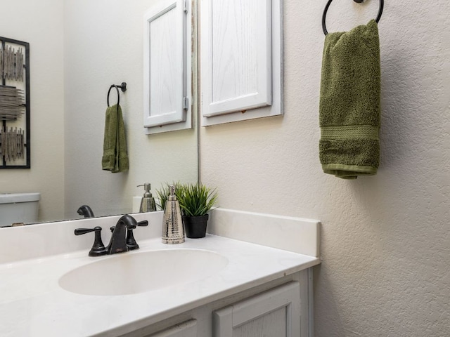 8001 Rimini Trl, Austin, TX 78729 - bathroom featuring vanity and toilet