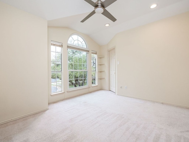 8001 Rimini Trl, Austin, TX 78729 - carpeted spare room with ceiling fan, recessed lighting, lofted ceiling, built in features, and baseboards