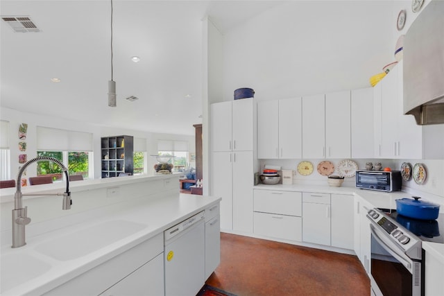 kitchen featuring white dishwasher, a sink, light countertops, a toaster, and stainless steel electric stove