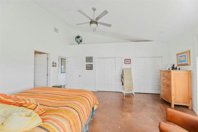 bedroom with ceiling fan, high vaulted ceiling, concrete floors, two closets, and visible vents